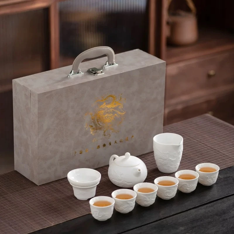 0124 羊脂玉浮雕龙西施壶+6杯+公杯中国龙灰皮箱