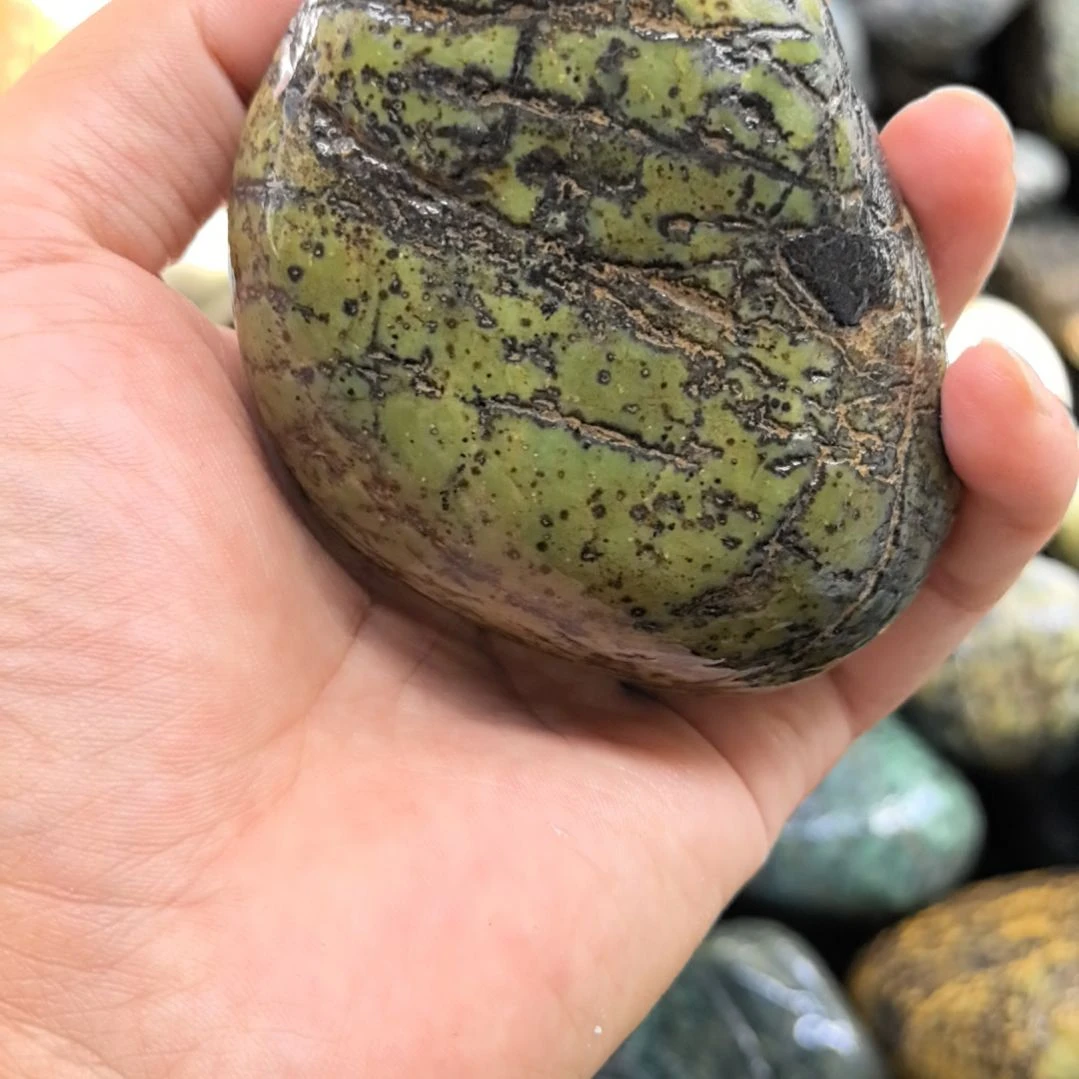 睛***理有机玻璃藏玉药王石原石手把件一个