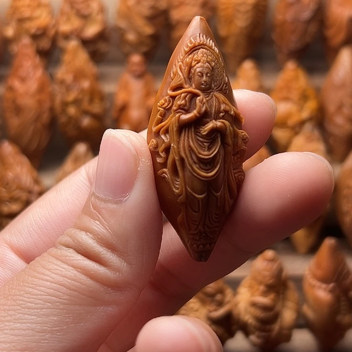 衣***力吊坠橄榄核橄榄核