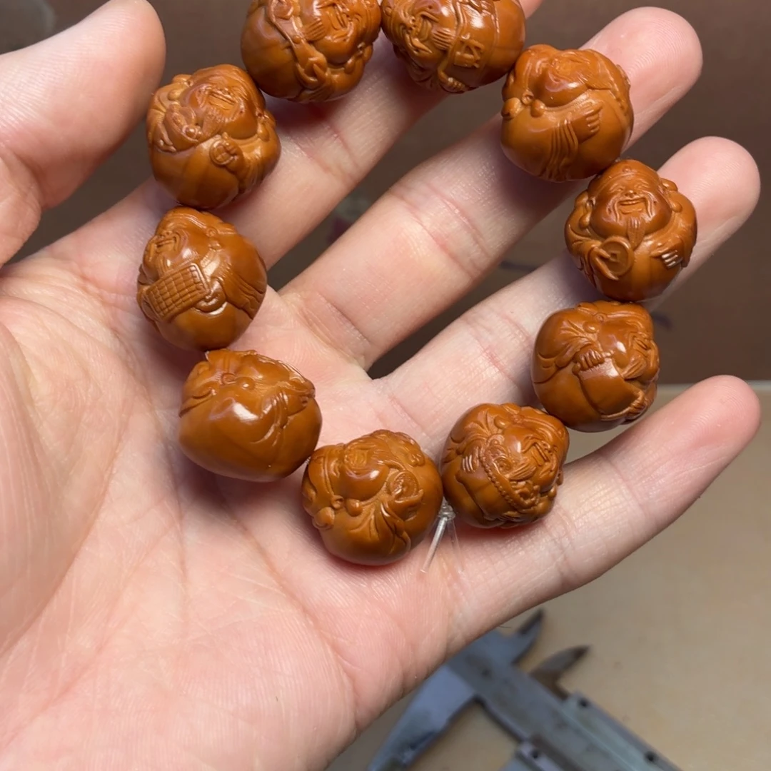 手串橄榄核光背财神
