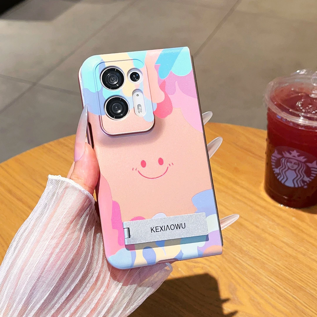 适用于【OPPOFINDN2】涂鸦笑脸金属漆折叠创意支架手机壳女款