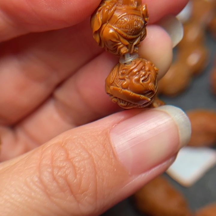 橄榄核吊坠郭****服橄榄核