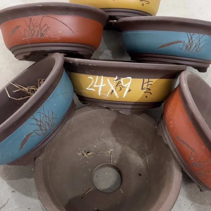 紫砂花盆100-7。         24-9