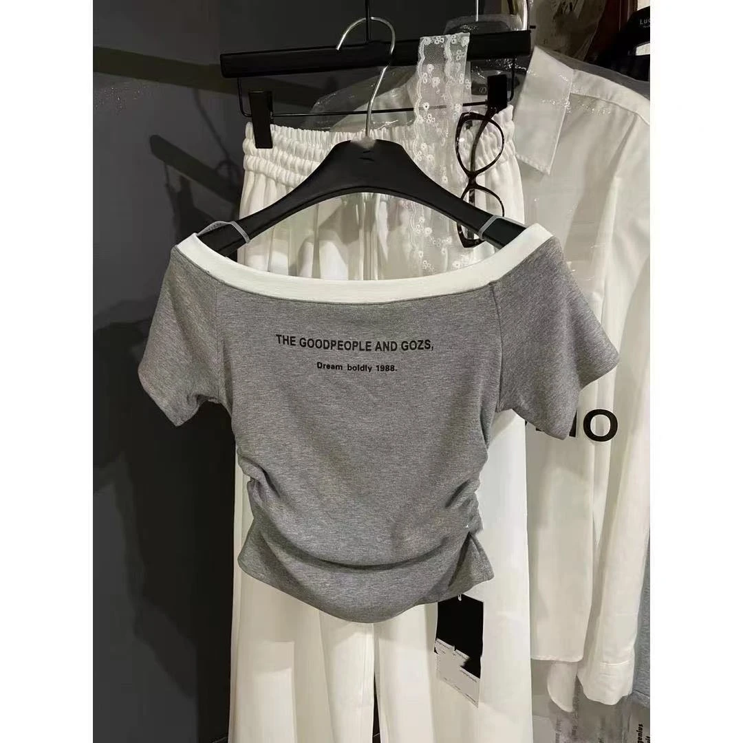 十三行字母斜漏肩拼色短袖恤女早春新款设计感辣妹显瘦上衣爆款