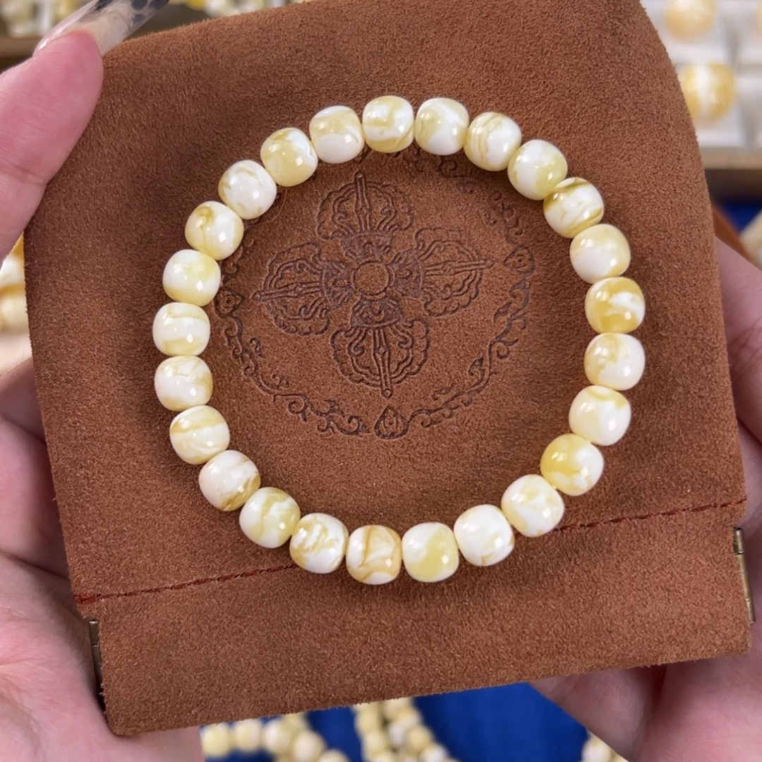 L***•琥珀未镶嵌手串金瓷白妖花8.5m