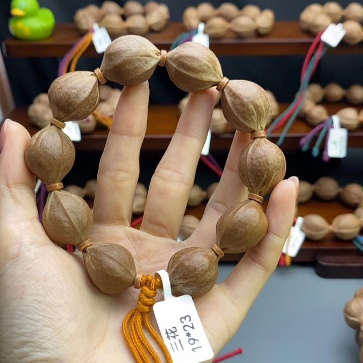 武***店吊坠橄榄核11111111