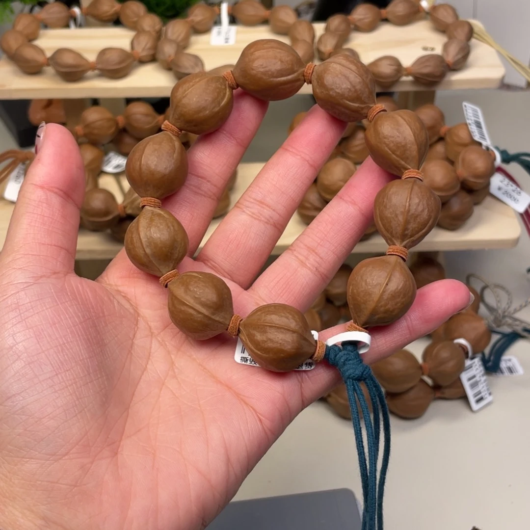 顾***页橄榄核手串/手链19.5*25梅林铁核