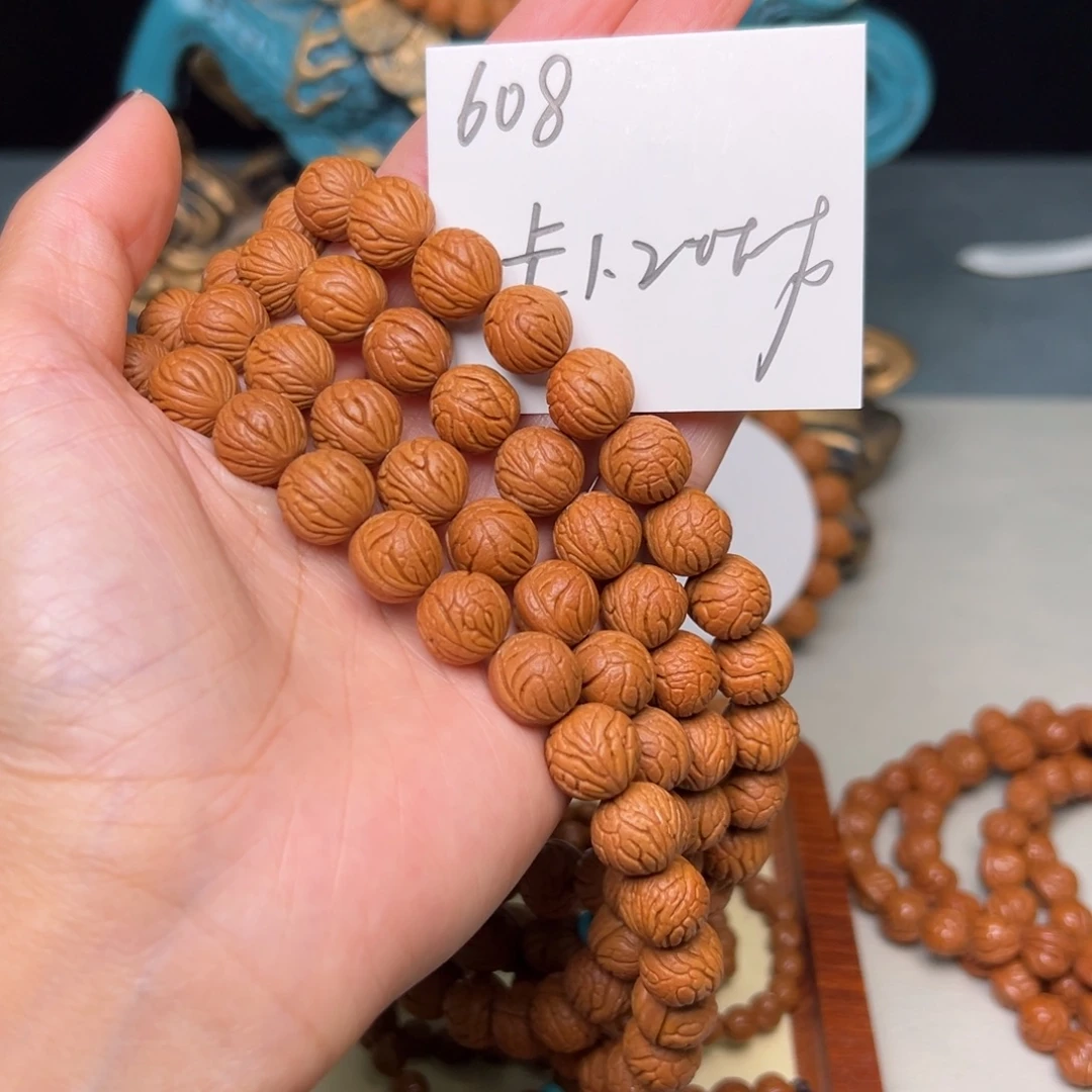 朝***舞吊坠桃核秦岭野生龙纹桃核