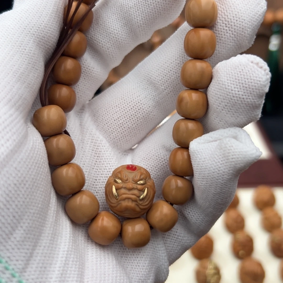 猴头核桃手串微瑕老型。獠牙