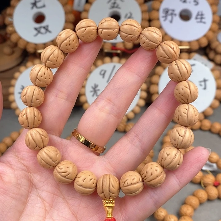 桃核手串奶油12头尾精修全体抛光