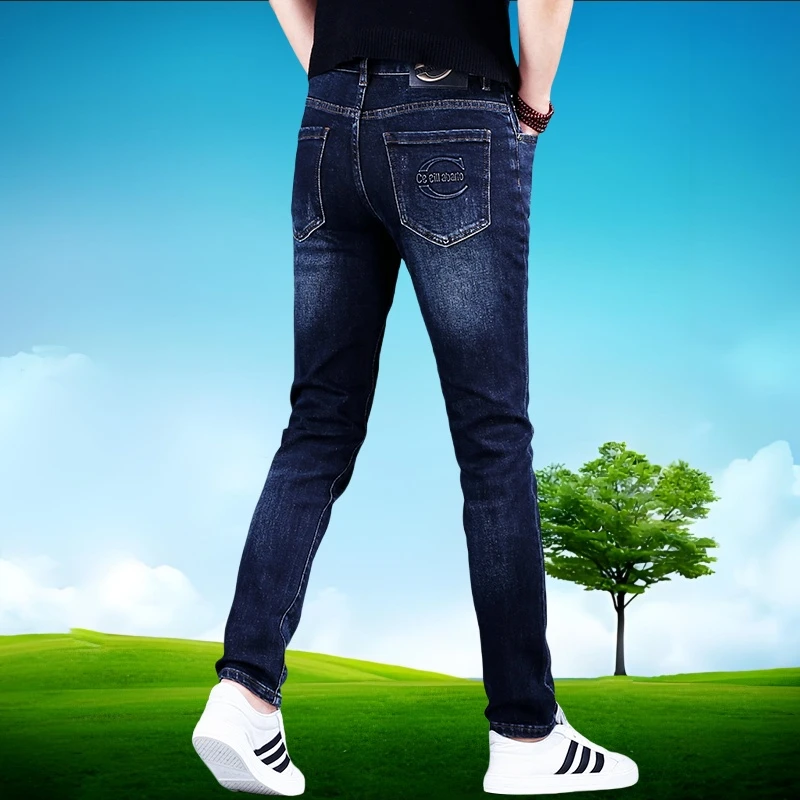 香港高端蓝黑牛仔裤男秋冬季修身小脚弹力男士休闲长裤子潮牌印花
