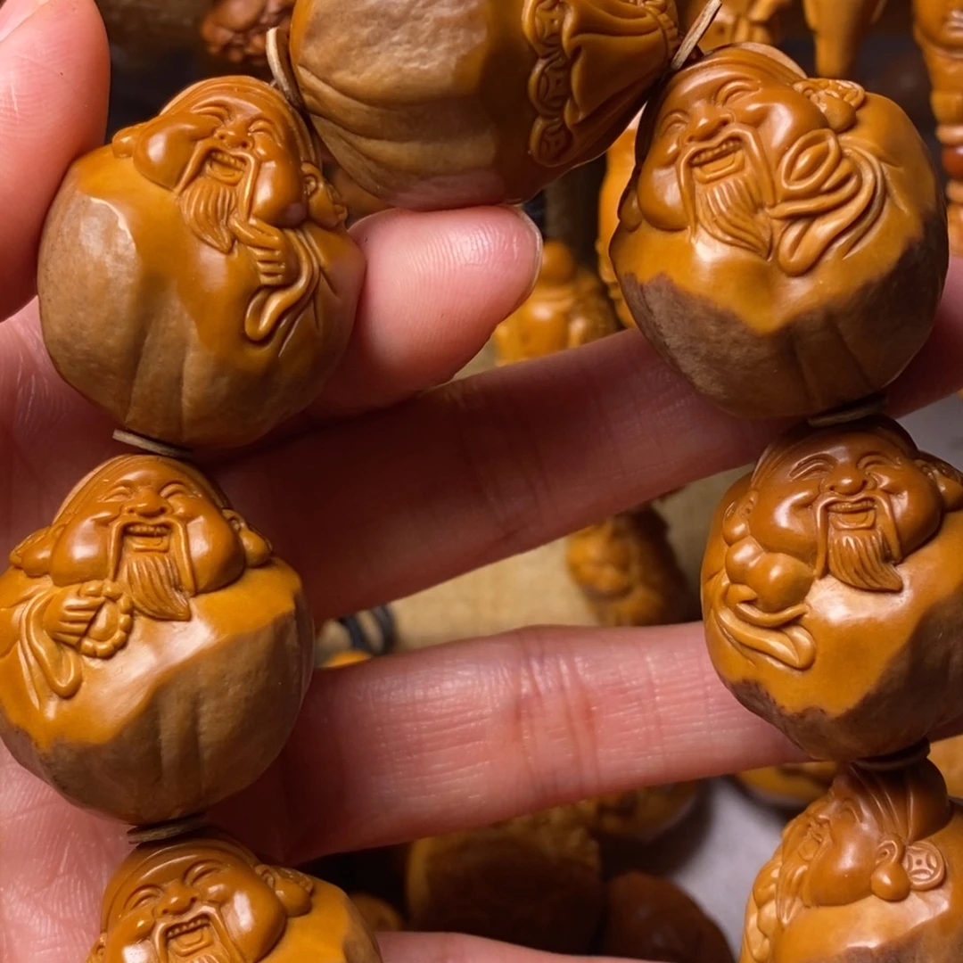 …***橄榄核手串/手链包衣财神精品