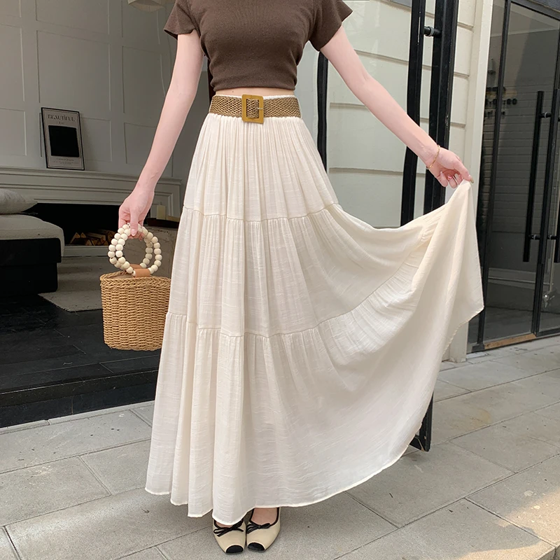 复古棉麻白色半身裙配皮带2025夏季新款显瘦垂感透气大摆长裙女
