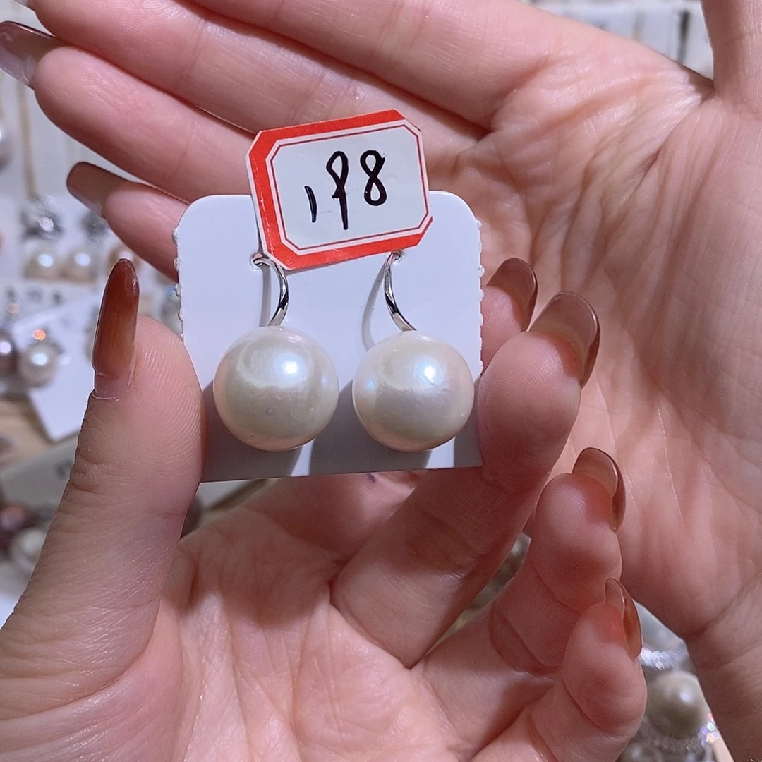 曦***儿淡水珍珠耳饰银S925镶嵌w15.2