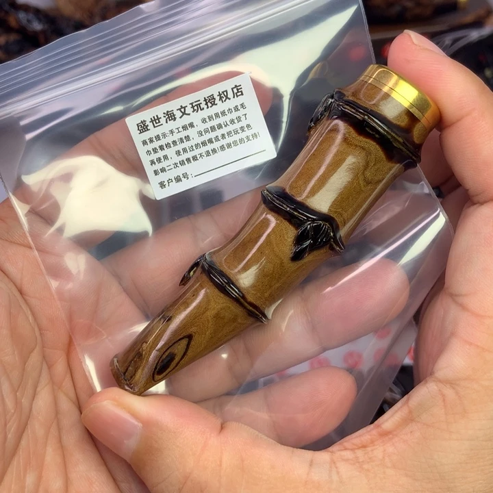 萧***情橄榄核吊坠海柳烟嘴海柳烟嘴