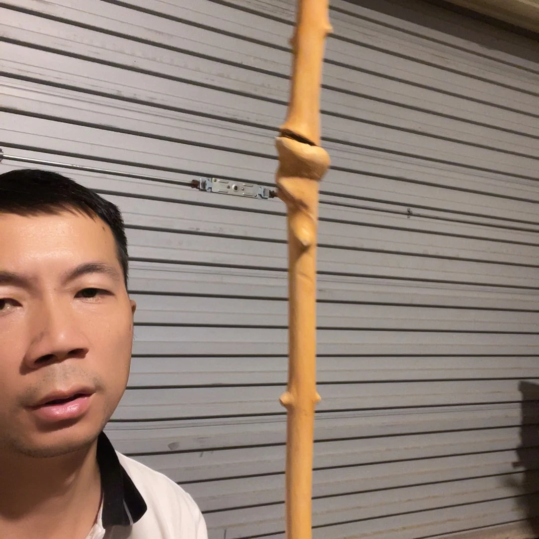 伊***(贵州对节木把玩棍