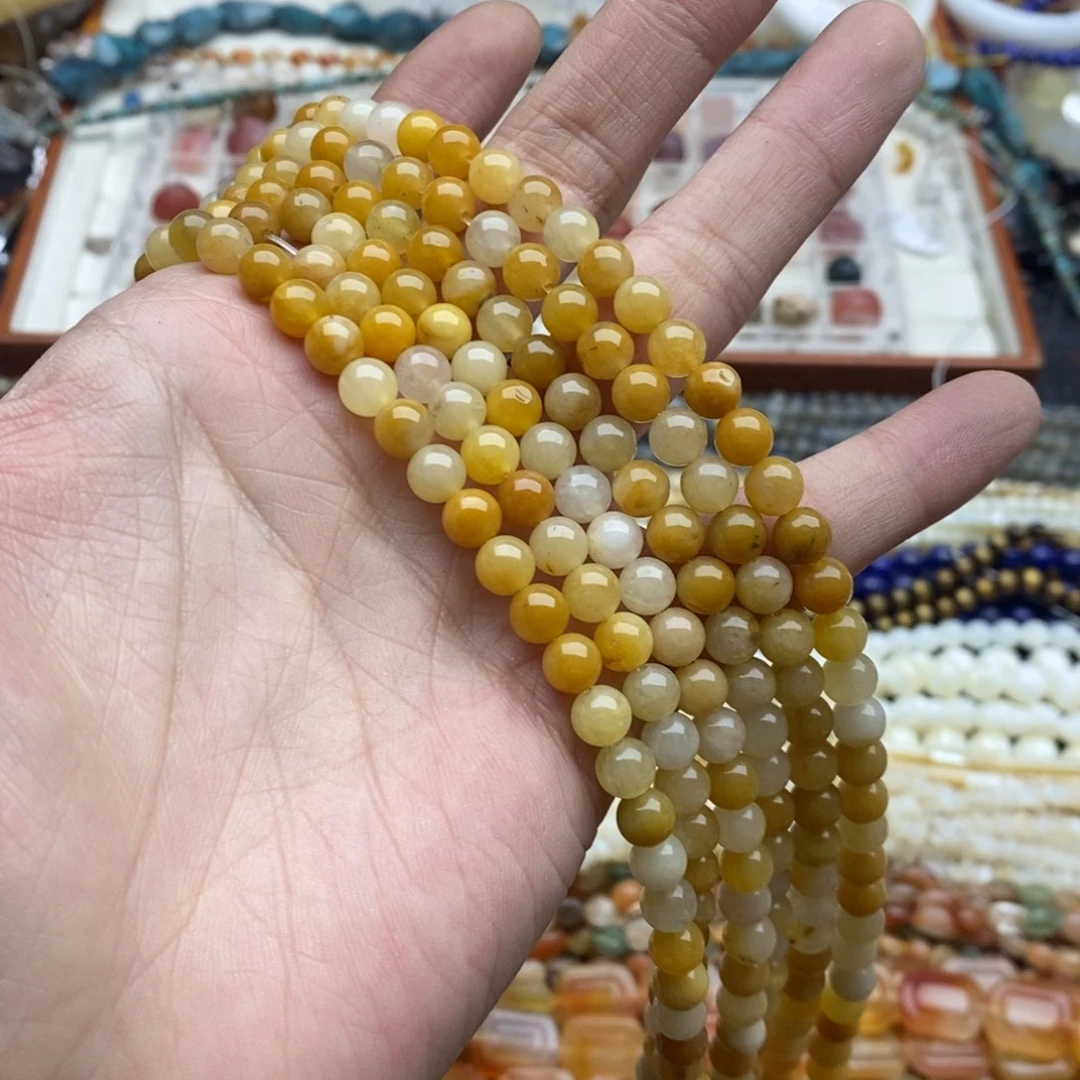 玛瑙/玉髓未镶嵌珠宝半成品一条天然6.5mm黄金丝玉圆珠