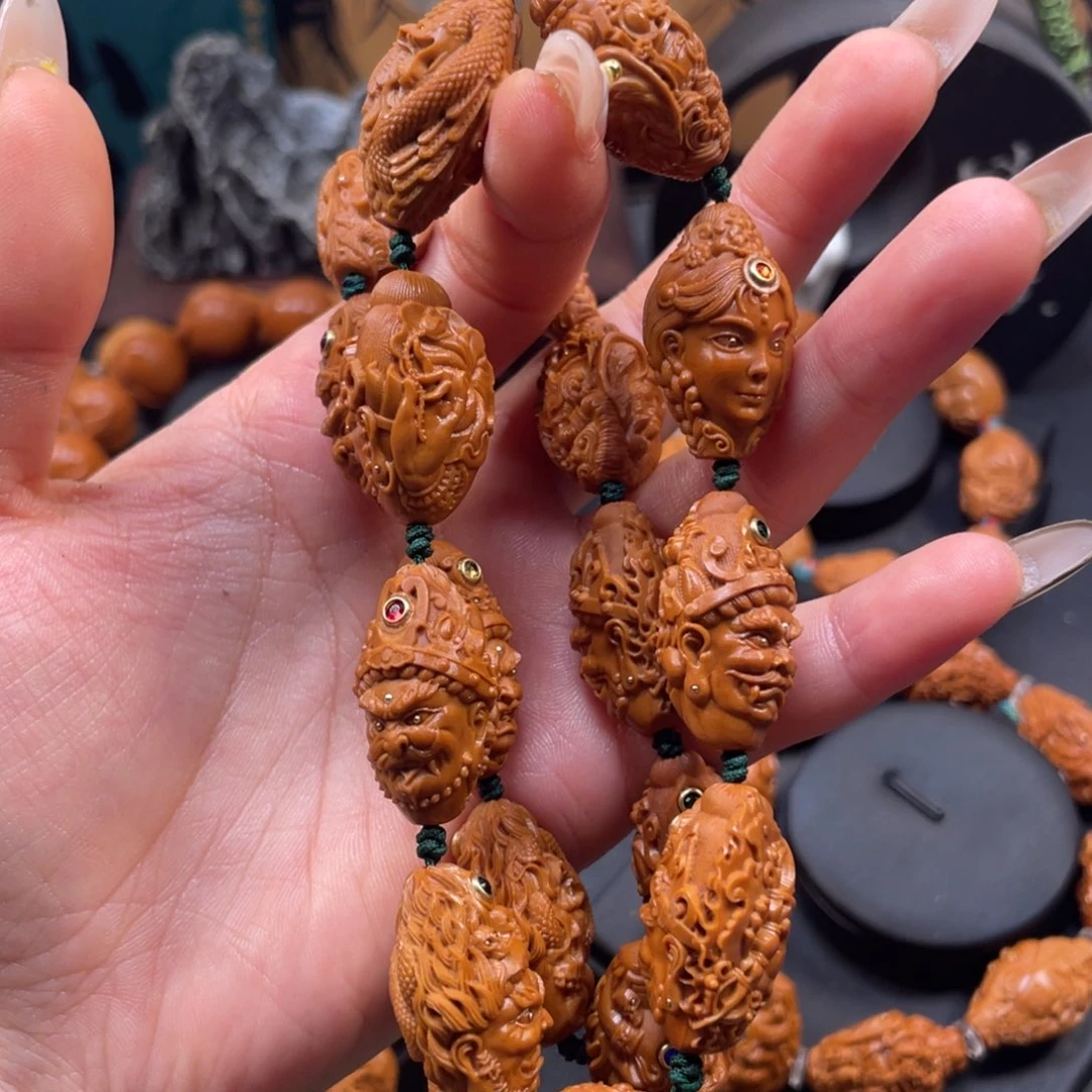 牧***调橄榄核吊坠五色财神