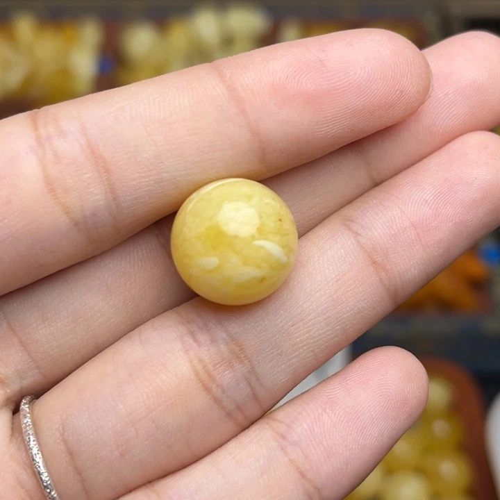 蜜蜡未镶嵌珠宝奇石鸡油黄满蜡妖花圆珠 微瑕
