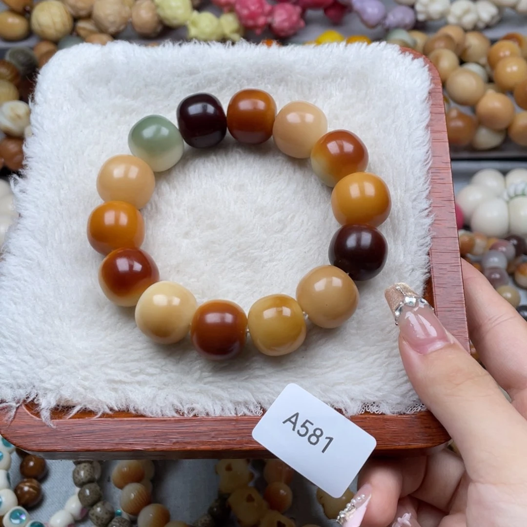 菩提根/象牙果手串瑕A581桶珠18mm一串随机