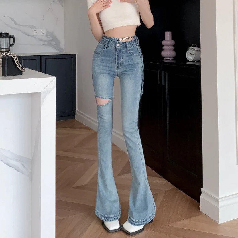 迪否镂空马蹄裤2025夏季新款微喇牛仔裤女高腰显瘦喇叭裤9561