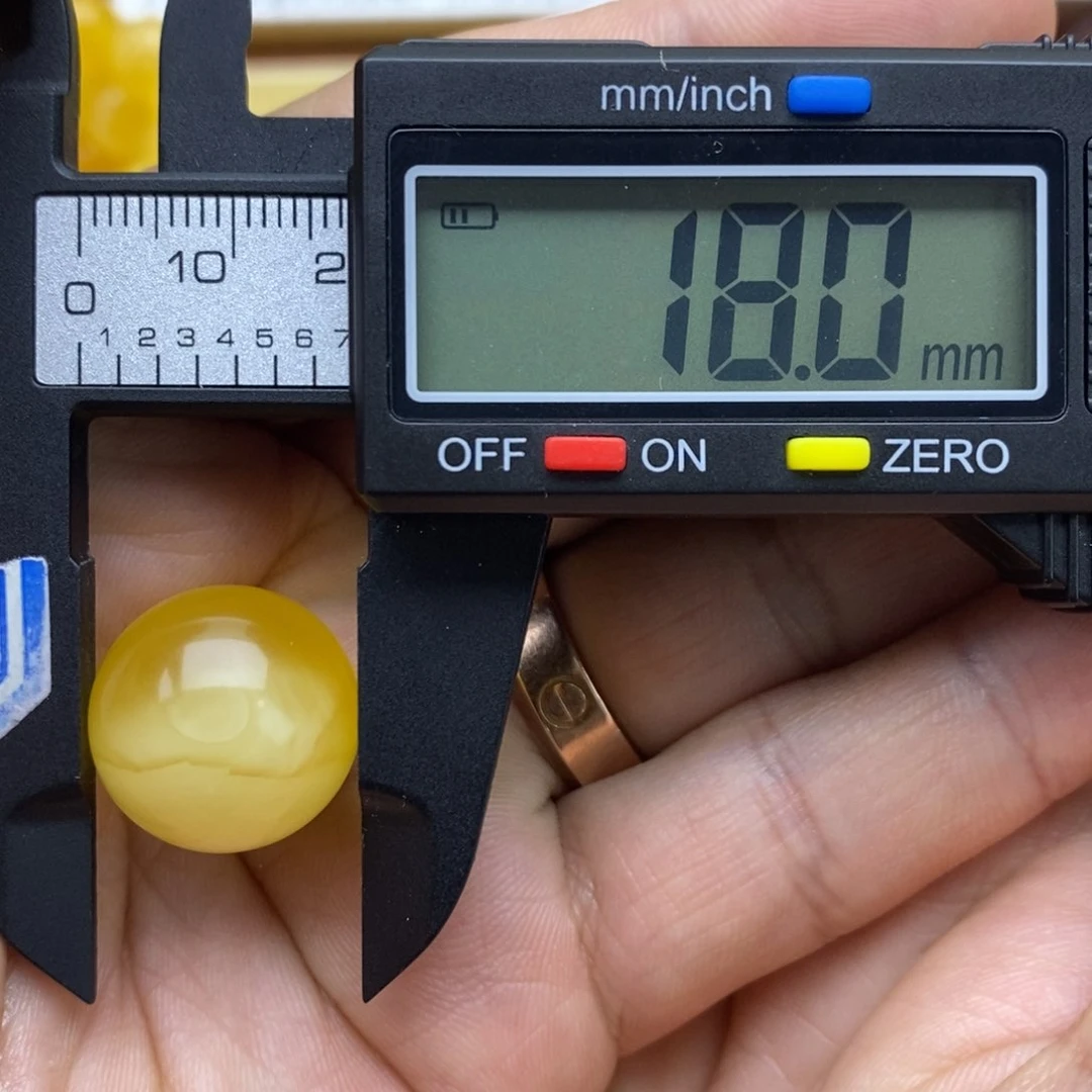 琥珀裸石未镶嵌今***了18圆珠默认直发打孔不退不换