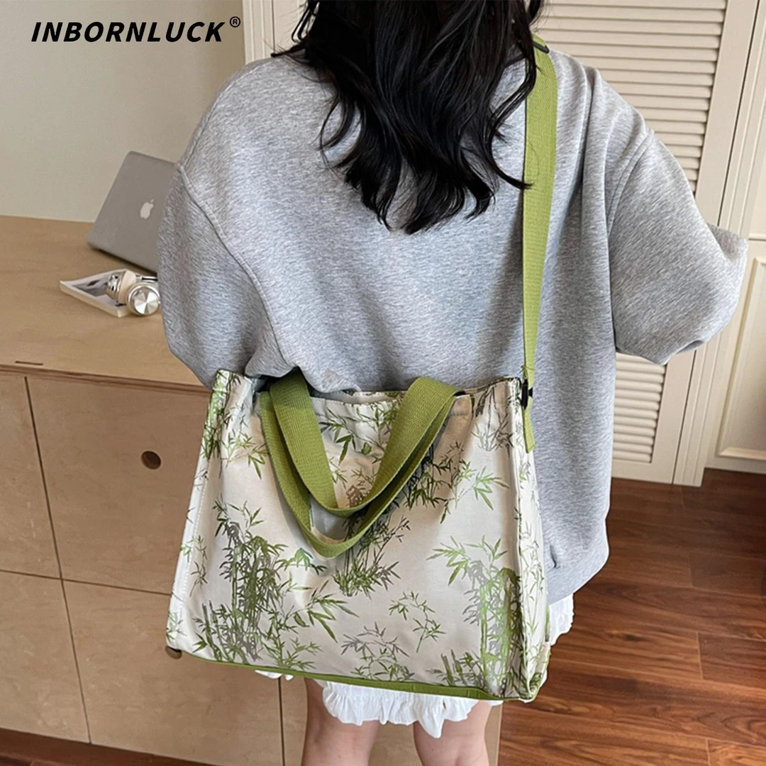 刺绣帆布包女大容量2025新款夏季百搭斜挎包大学生上课通勤托特包