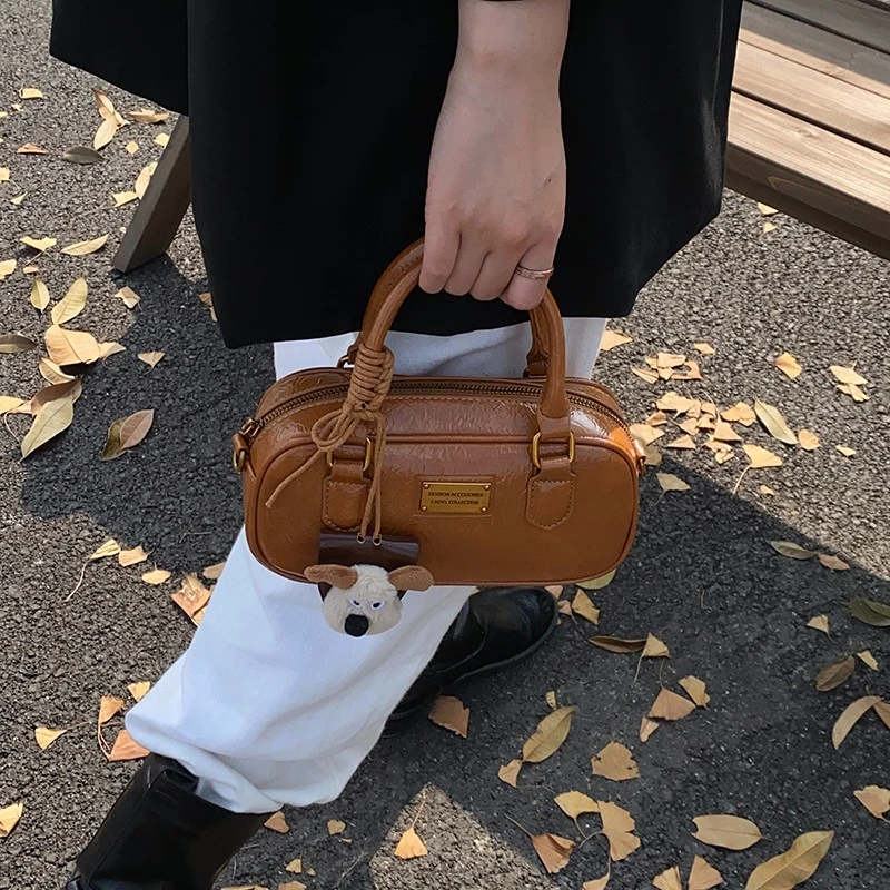 韩系小众手提包包爆款女款2025新款秋冬复古时尚枕头包百搭斜挎包