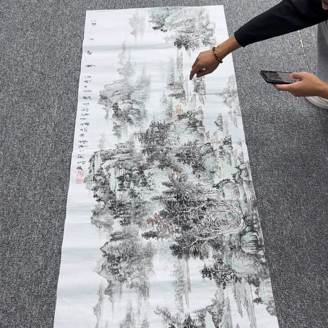 国画卖字画的小男孩