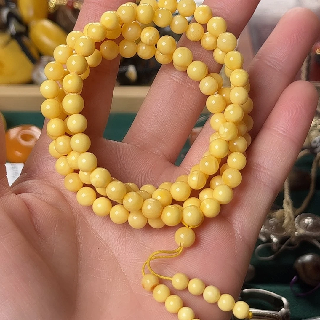 琥珀未镶嵌颈饰藏地朵朵分享的时候