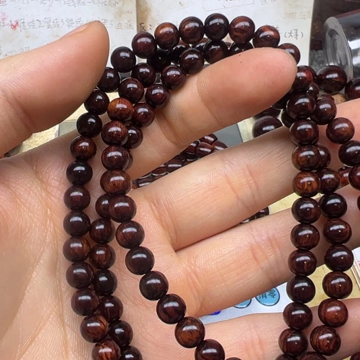 手串/手链花梨木类海南海南06-108圆珠黑金底一档