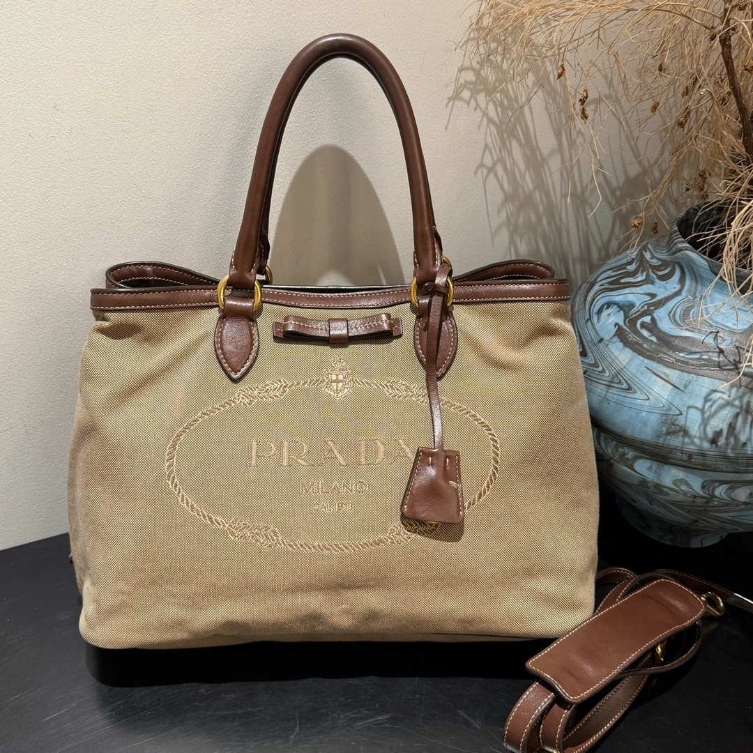 95新 Prada/普拉达 流浪者复古印花帆布焦糖色托特包18276303