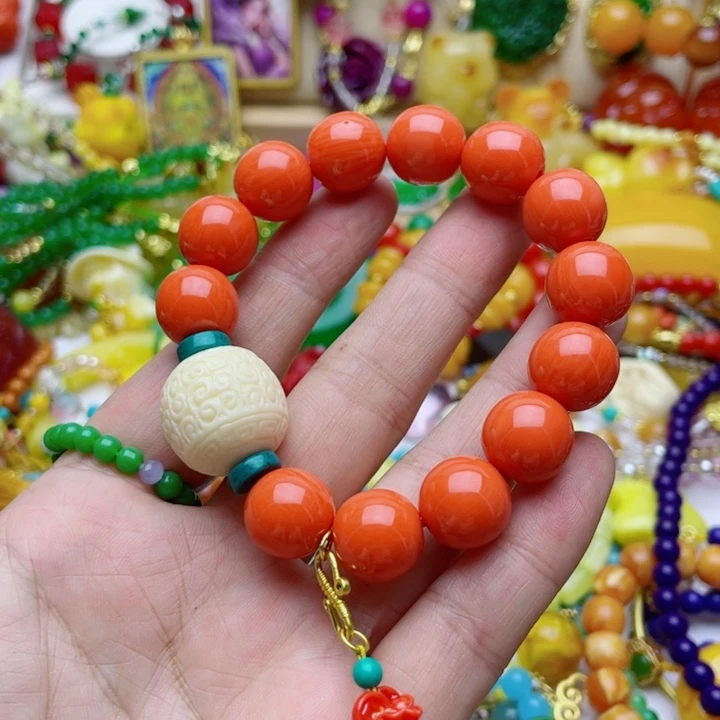 树脂制品天*69号橘色手串