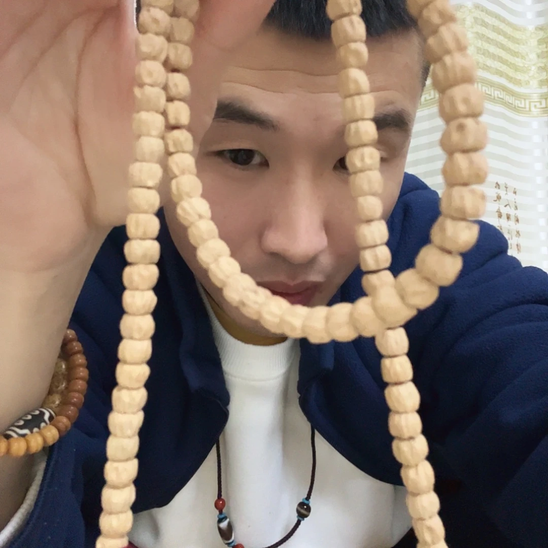 吊坠文玩核桃百香籽。