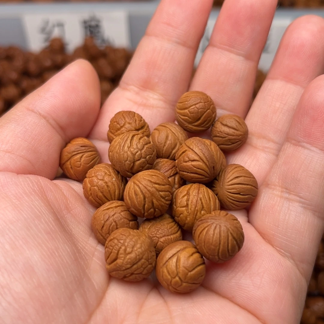 桃核把件12左右满天星散籽20颗（打孔）