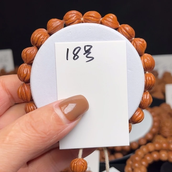 冷***梦桃核吊坠佛手10左右手串