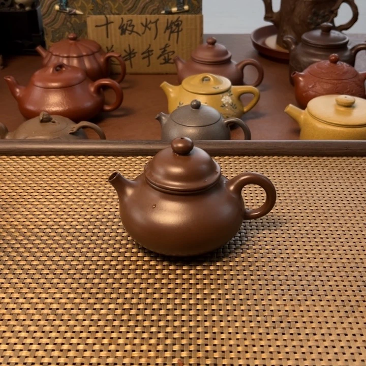 紫砂茶壶惘**失容天深井老紫泥半手壶