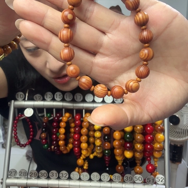 故***续松木原生态琥珀木手串1.0猫眼