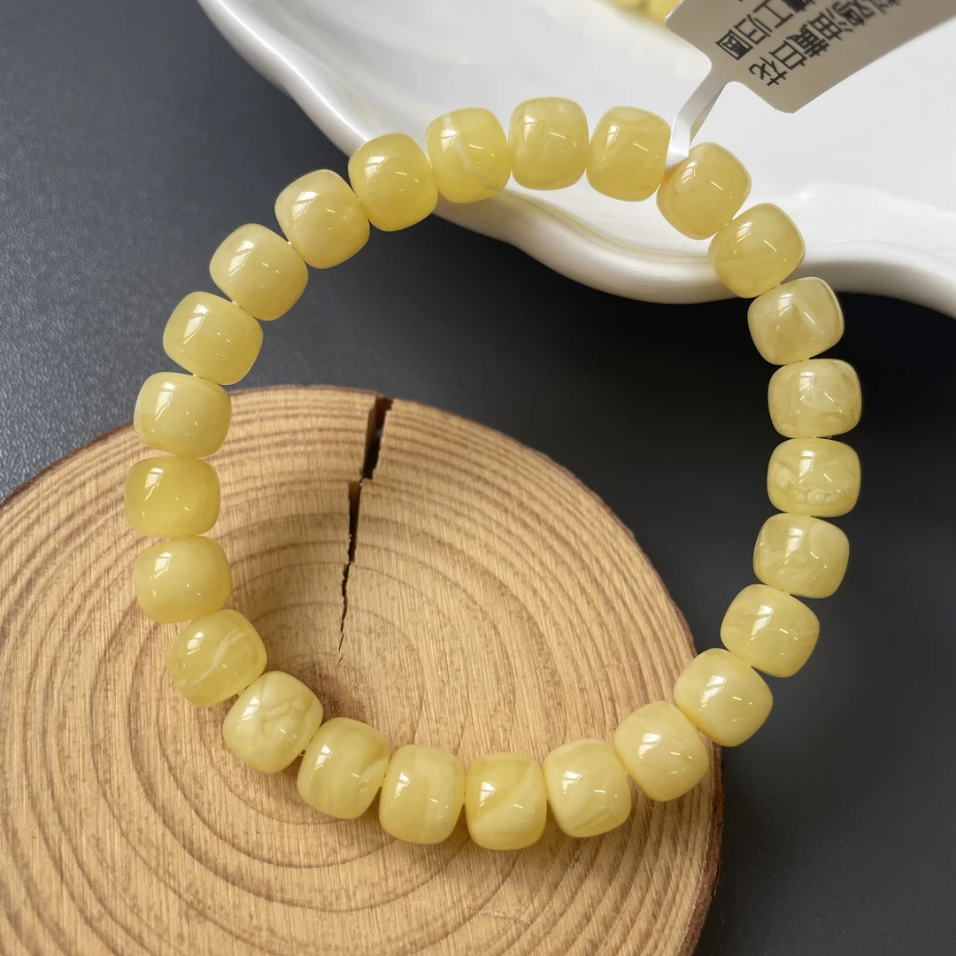 俄料鸡油黄白花纹蜜蜡精工归圆老型珠单圈约7*8mm