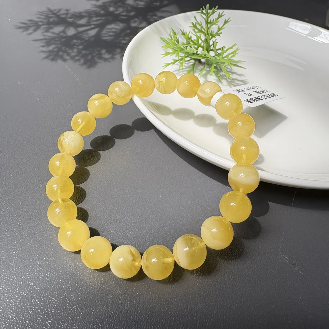 金绞白花蜜蜡圆珠单圈约8.5mm