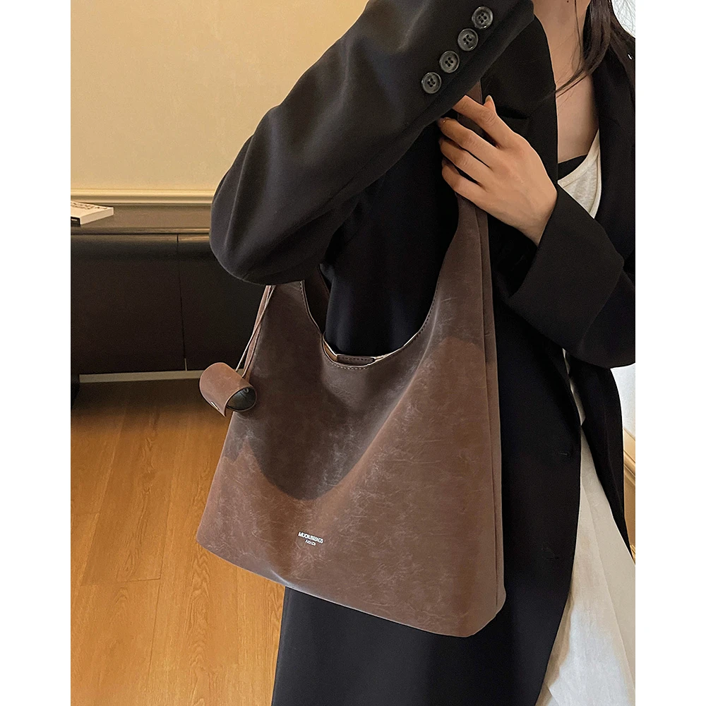 托特包大包包女2025新款韩版复古腋下包时尚通勤百搭爆款单肩包