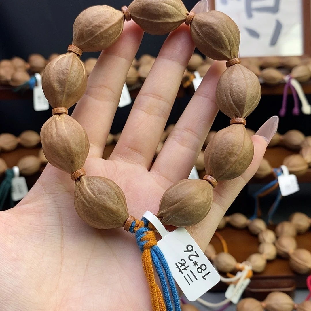 骑***星吊坠橄榄核梅林铁核