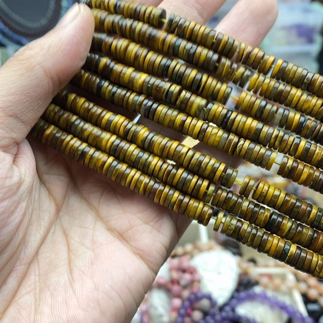 玛瑙/玉髓未镶嵌珠宝半成品一条天然1.5×6超薄黄虎石隔片