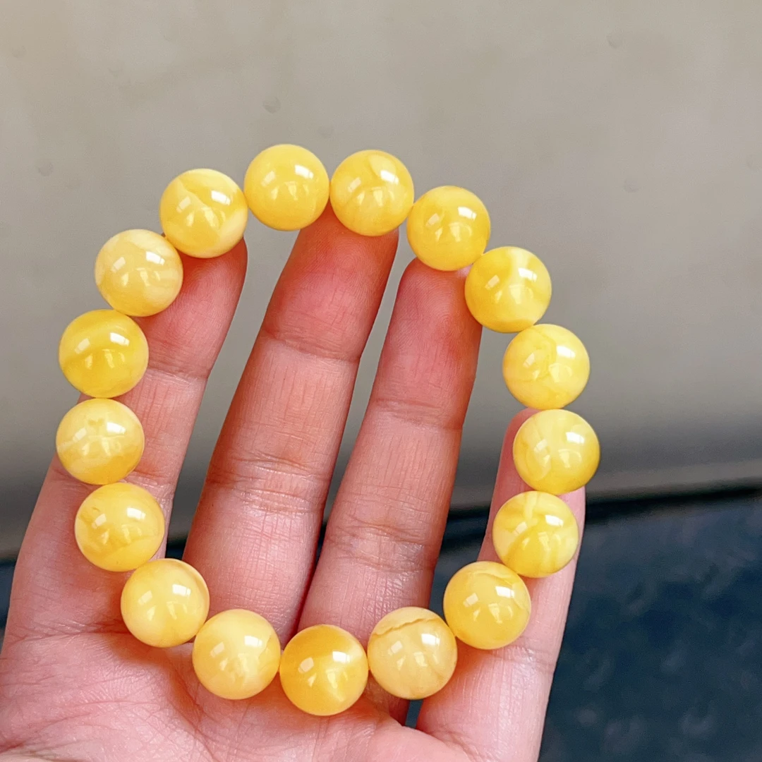 12mm+俄料鸡油黄蜜蜡圆珠手串，蜡质漂亮，珠子干净，16.9克