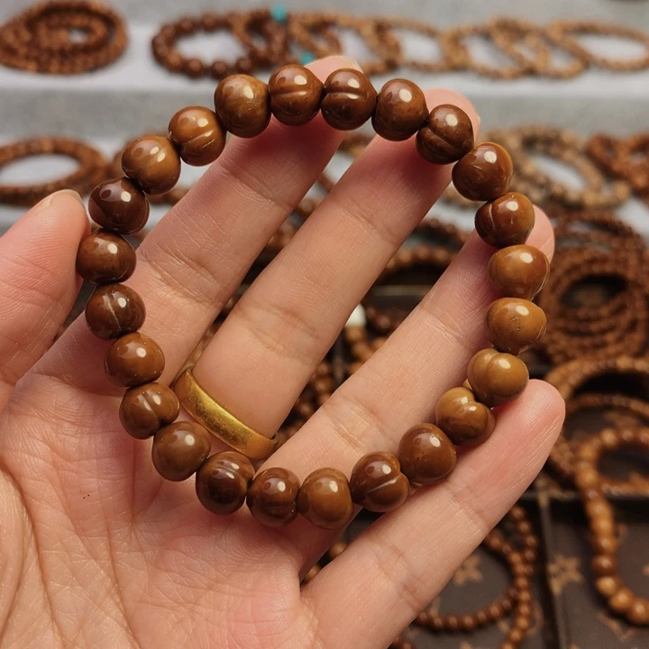 果皮天然库克精挑屁桃8*9单圈手串