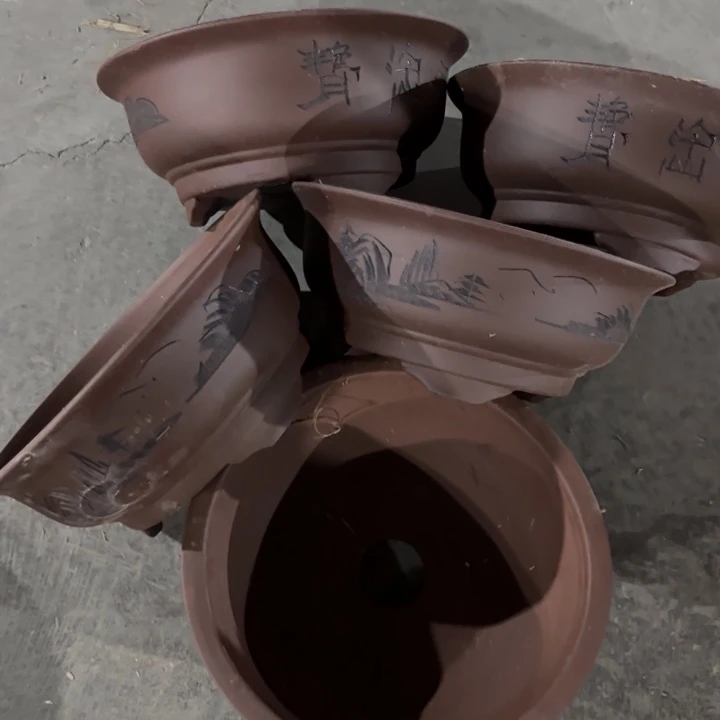 紫砂花盆100-5。    33-14