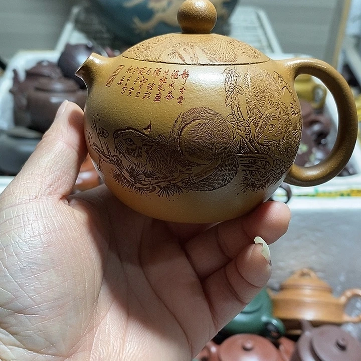 紫砂茶壶也，也微瑕