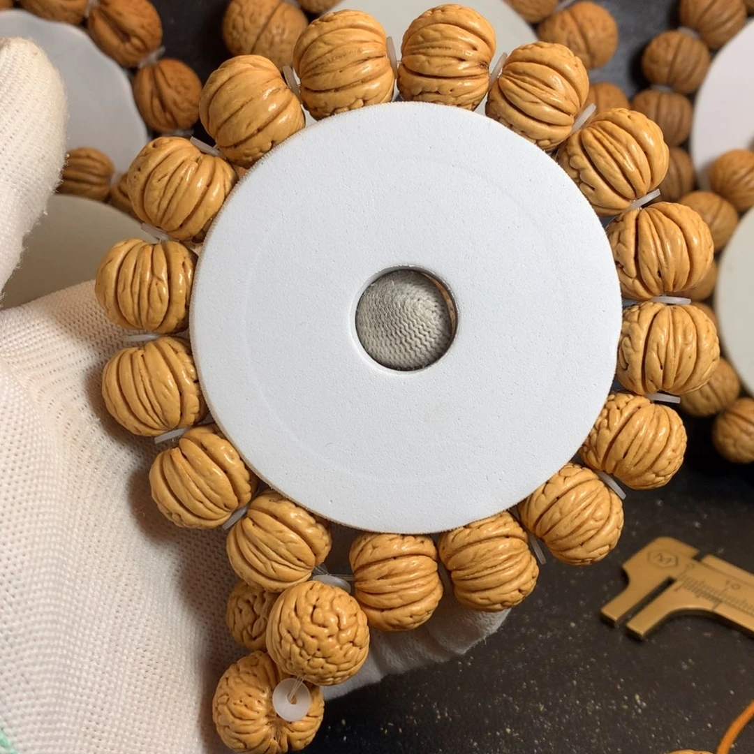 ****玄手串桃核16爆纹金丹