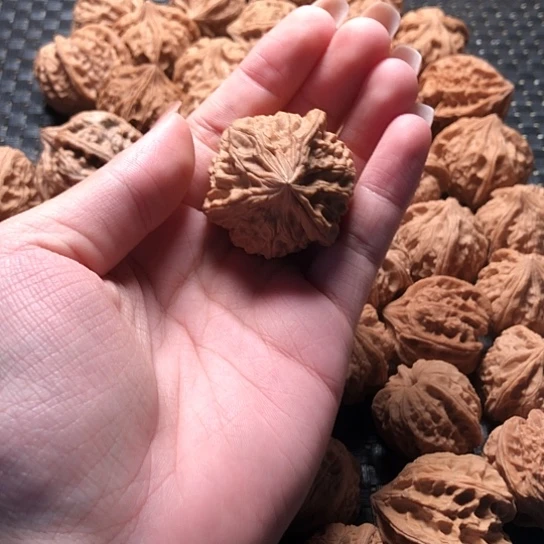 鸭***里桃核吊坠核桃核桃核桃