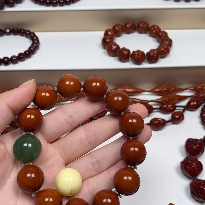 张***椒橄榄核雕刻工艺的发展